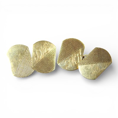 Lot 6 - A pair of 9 carat gold cufflinks, with engine...