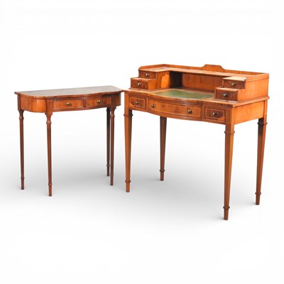 Lot 446 - A reproduction yew wood desk, together with a...