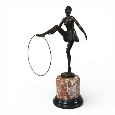 Lot 568 - An Art Deco style bronze figure of a hoop girl,...
