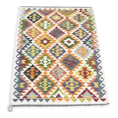 Lot 483 - A Persian kilim rug, with all over coloured...