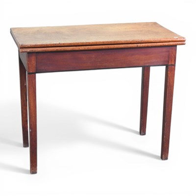 Lot 233 - A George III mahogany folding tea table, on...