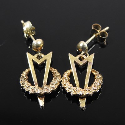 Lot 81 - A pair of 9 carat gold V for victory pendant...