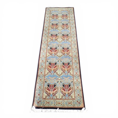Lot 250 - A William Morris design woollen carpet, 304 x...