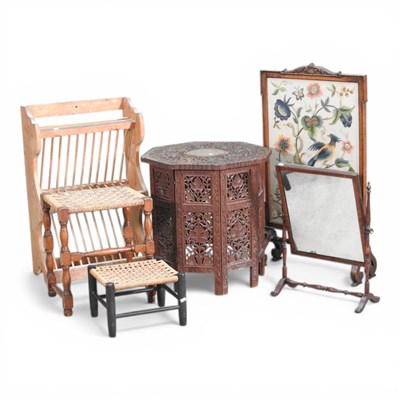 Lot 654 - An Indian carved hardwood occasional table,...