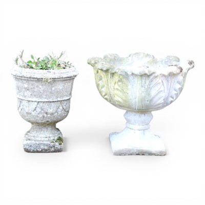 Lot 551 - A cast stone garden urn, 44cm high, together...