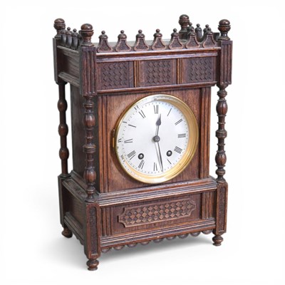 Lot 438 - A 19th century oak cased mantel clock, with an...
