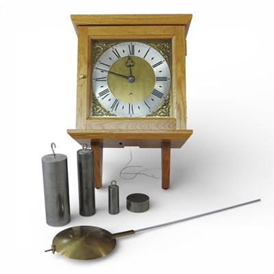 Lot 110 - A modern hood clock, with a brass dial,...