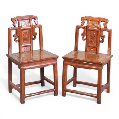 Lot 124 - A pair of Chinese carved side chairs (2)