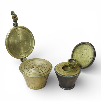 Lot 17 - A set of brass nesting cup weights, 4cm high,...