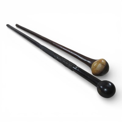 Lot 216 - An African carved ebony knobkerrie, with a...