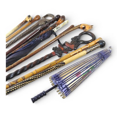 Lot 561 - A collection of walking sticks, to include...