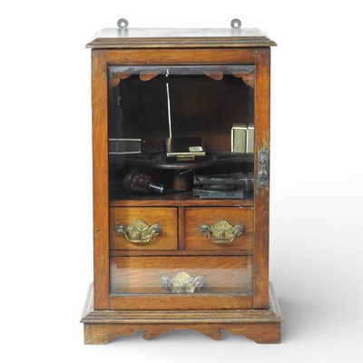 Lot 156 - An Edwardian oak smoker's cabinet, containing...