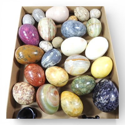 Lot 185 - A collection of polished specimen hardstone eggs