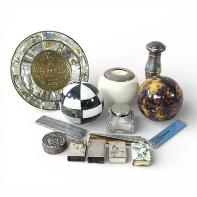 Lot 396 - An early 20th century silver mounted match...