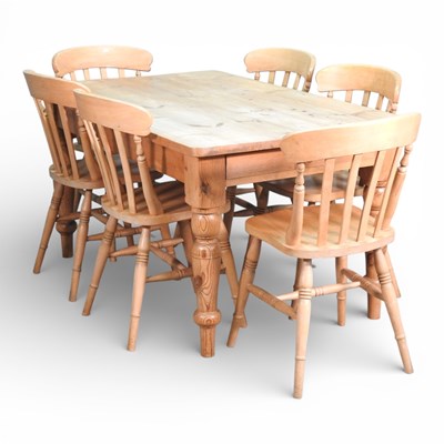 Lot 470 - A modern pine dining table, of rectangular...