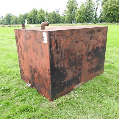 Lot 599 - A red painted metal fuel tank