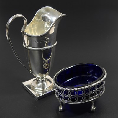 Lot 103 - An early 20th century silver cream, jug, of...