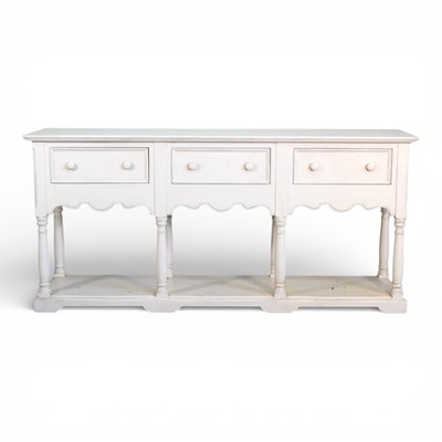 Lot 572 - A modern cream painted dresser base,...