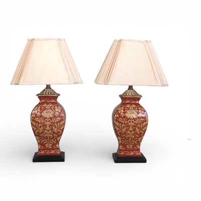 Lot 614 - A pair of modern red painted table lamps and...