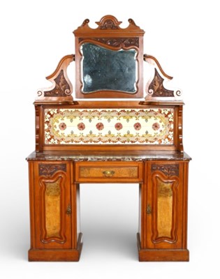 Lot 608 - A late Victorian carved walnut washstand,...