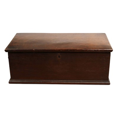 Lot 128 - An oak box with key and flanked by brass...