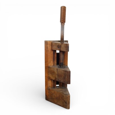 Lot 661 - A wooden clamp