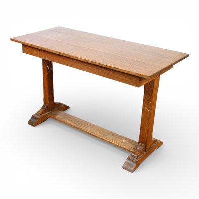 Lot 299 - An early 20th century oak side table on...