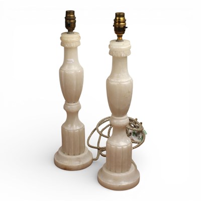 Lot 239 - A pair of neoclassical alabaster table lamps,...