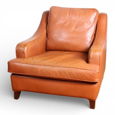 Lot 410 - A brown leather armchair by Multiyork, 80 x...