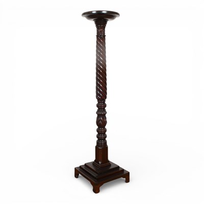 Lot 562 - A mahogany ropetwist carved torchere,...