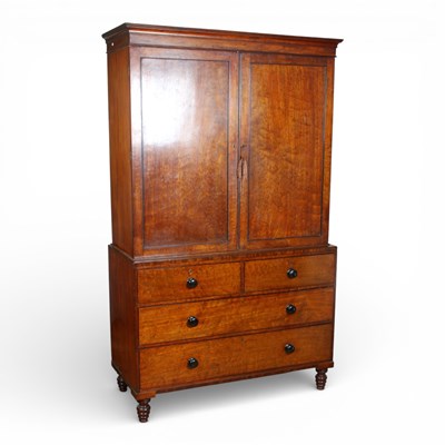 Lot 434 - A 19th century mahogany linen press, the...
