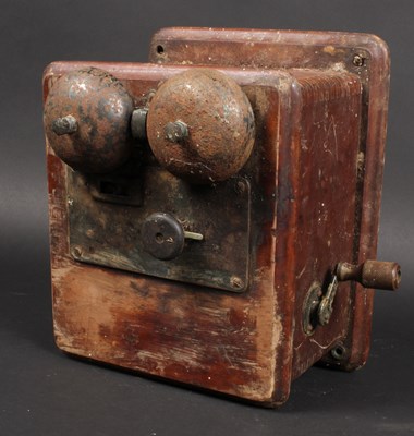 Lot 694 - An Edwardian servants bell, in a mahogany case.