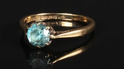Lot 49 - A 9 carat yellow gold blue gem set dress ring,...