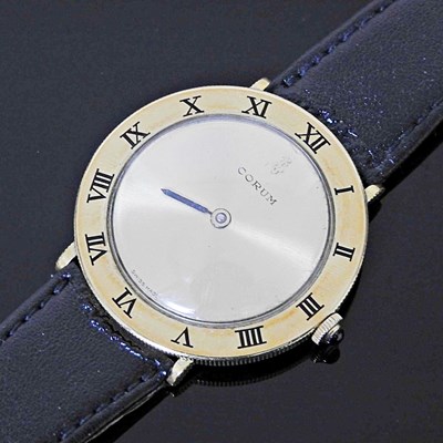 Lot 230 - A Corum Romulus 18 carat gold cased vintage...
