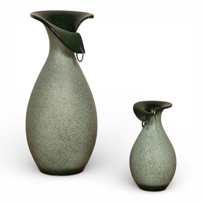 Lot 197 - A pair of large speckled green pottery vases