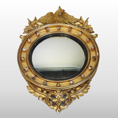 Lot 39 - A Regency carved pine and gilt gesso framed convex wall mirror