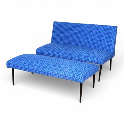 Lot 424 - A mid century blue wool sofa and footstool
