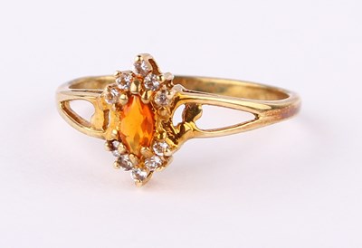 Lot 43 - A 9 carat gold fire opal and white topaz ring,...