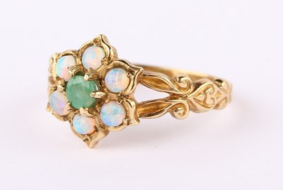 Lot 32 - A 9 carat gold emerald and opal ring...