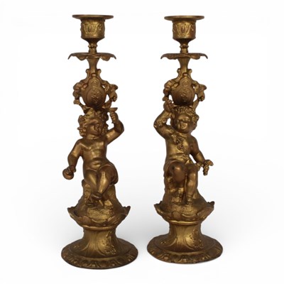 Lot 379 - A pair of 19th century brass cherub...