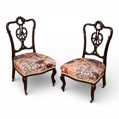 Lot 589 - A pair of Edwardian carved bedroom chairs.