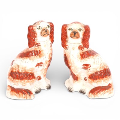 Lot 495 - A pair of Victorian Staffordshire spaniels,...