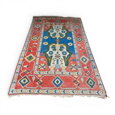 Lot 278 - A large Turkish woollen rug, 310 x 210cm