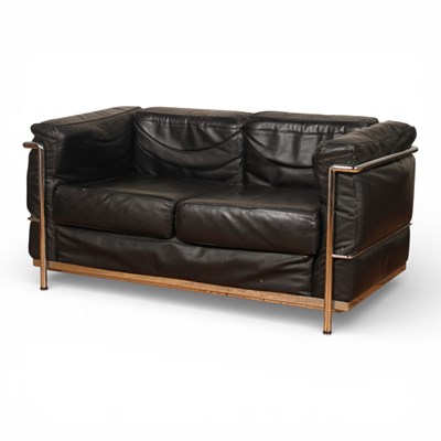 Lot 295 - After Le Corbusier, a chrome and black leather...