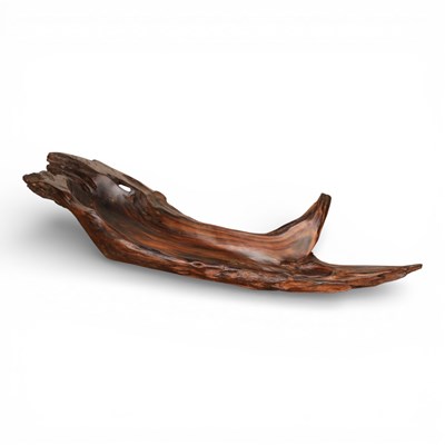 Lot 670 - A large natural hardwood dish, 83cm wide