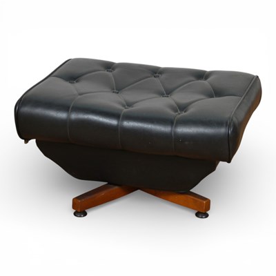 Lot 523 - A mid century black leather upholstered swivel...