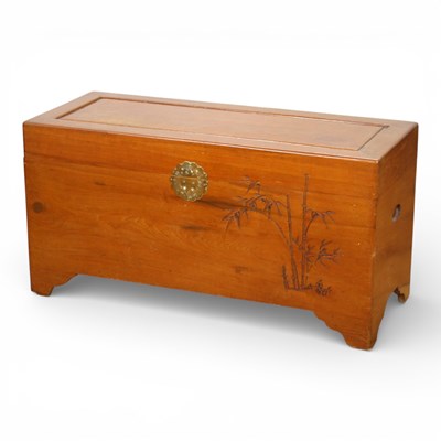 Lot 569 - A Chinese camphor wood trunk with bamboo...