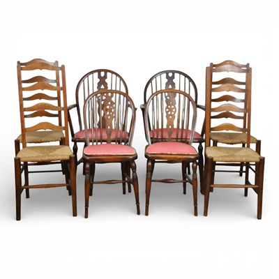 Lot 680 - A set of oak ladder back dining chairs,...