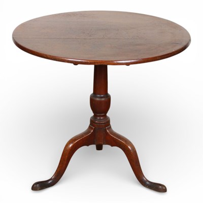Lot 371 - A George III mahogany tilt top on tripod legs,...