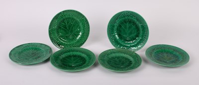 Lot 275 - A set of six Victorian majolica green leaf...